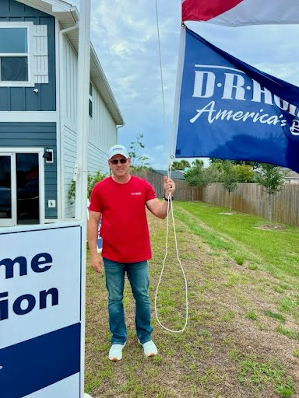 Eric of DR Horton putting out flags in the field