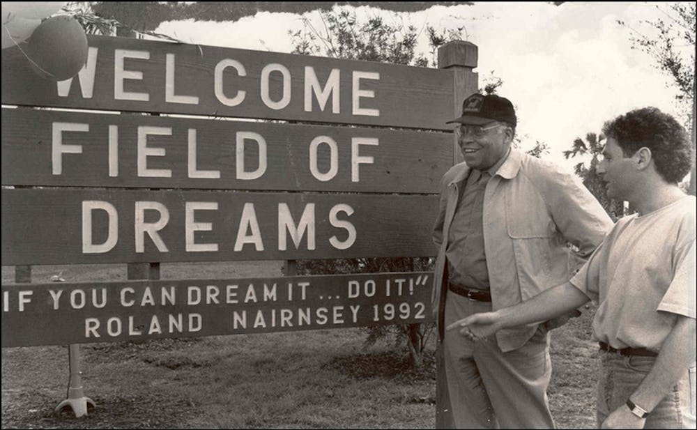 A very young Roland with his famous friend, James Earl Jones